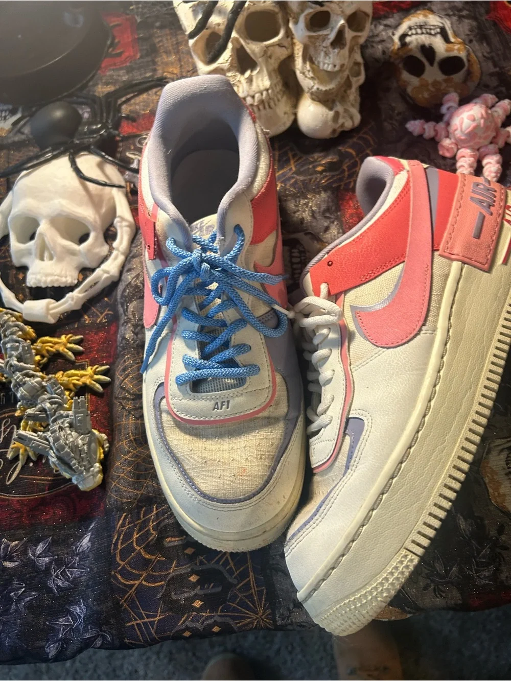 Nike White and Blue Athletic Shoes with Pink Accent